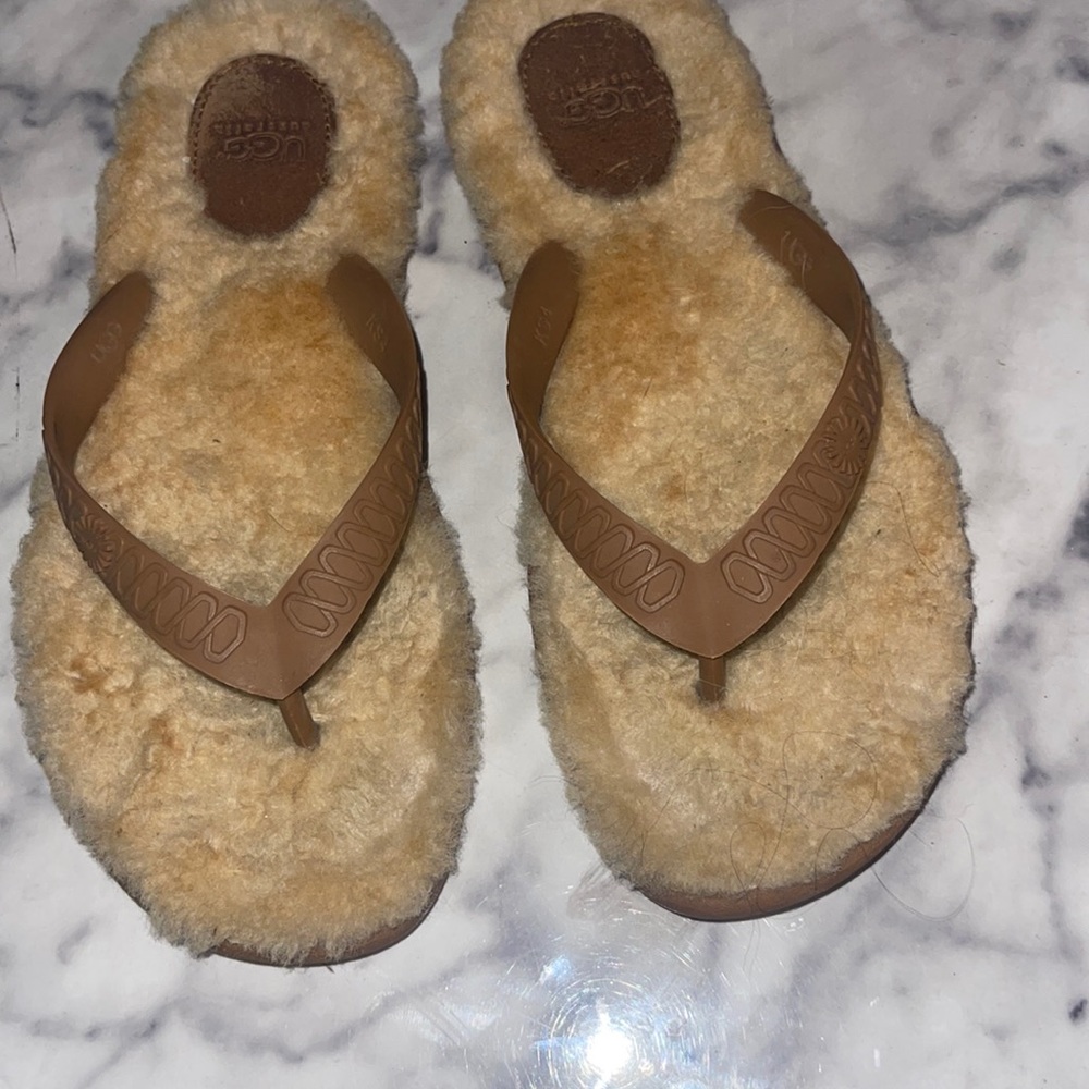 Adorable tan UGG flip-flops size 6 very gently worn. No stains or tears.